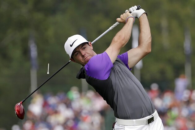 Rory McIlroy, of Northern Ireland, watches his tee shot on the fifth hole during the final round of the PGA Championship golf tournament at Valhalla Golf Club on Sunday, Aug. 10, 2014, in Louisville, Ky. (AP Photo/David J. Phillip)