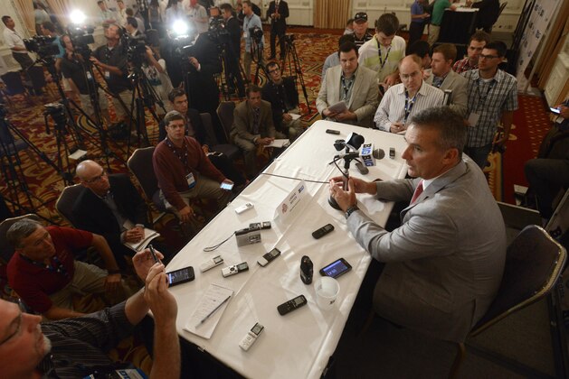 Ohio State head coach Urban Meyer talks to the media during the Big Ten Football Media Day in Chicago, Monday, July 28, 2014. (AP Photo/Paul Beaty)