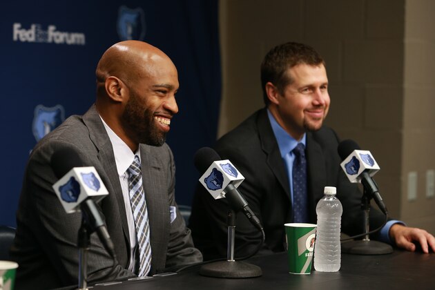 MEMPHIS, TN - JULY 14: Vince Carter #15 of the Memphis Grizzlies with head coach David Joerger address the media on July 14, 2014 at FedExForum in Memphis, Tennessee. NOTE TO USER: User expressly acknowledges and agrees that, by downloading and or using this photograph, user is consenting to the terms and conditions of the Getty Images License Agreement. Mandatory Copyright Notice: Copyright 2014 NBAE (Photo by Joe Murphy/NBAE via Getty Images)