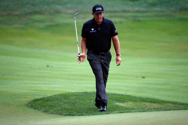 LOUISVILLE, KY - AUGUST 10:  Phil Mickelson of the United States walks to the 18th green during the final round of the 96th PGA Championship at Valhalla Golf Club on August 10, 2014 in Louisville, Kentucky.  (Photo by Sam Greenwood/Getty Images)