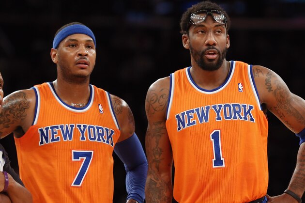 NEW YORK, NY - DECEMBER 08: Carmelo Anthony #7 and Amar'e Stoudemire #1 of the New York Knicks wait for play to resume during the second quarter against the Boston Celtics at Madison Square Garden on December 8, 2013 in New York City. NOTE TO USER: User expressly acknowledges and agrees that, by downloading and or using this Photograph, user is consenting to the terms and conditions of the Getty Images License Agreement.  (Photo by Bruce Bennett/Getty Images)