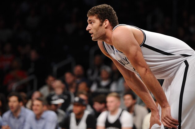 NEW YORK, NY - DECEMBER 12:  Brook Lopez #11 of the Brooklyn Nets looks on during the first half against the Los Angeles Clippers at Barclays Center on December 12, 2013 in the Brooklyn borough of New York City. NOTE TO USER: User expressly acknowledges and agrees that, by downloading and/or using this photograph, user is consenting to the terms and conditions of the Getty Images License Agreement.  (Photo by Maddie Meyer/Getty Images)