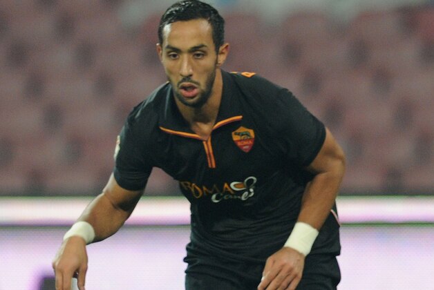 NAPLES, ITALY - FEBRUARY 12:  Mehdi Benatia of Roma in action during the TIM Cup match between SSC Napoli and AS Roma at Stadio San Paolo on February 12, 2014 in Naples, Italy.  (Photo by Giuseppe Bellini/Getty Images)