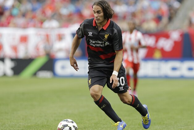 Liverpool FC midfielder Lazar Markovic (50) controls the ball against the Olympiacos during the first half of International Champions Cup soccer match in Chicago, Sunday, July 27, 2014. The Liverpool FC won 1-0. (AP Photo/Nam Y. Huh)