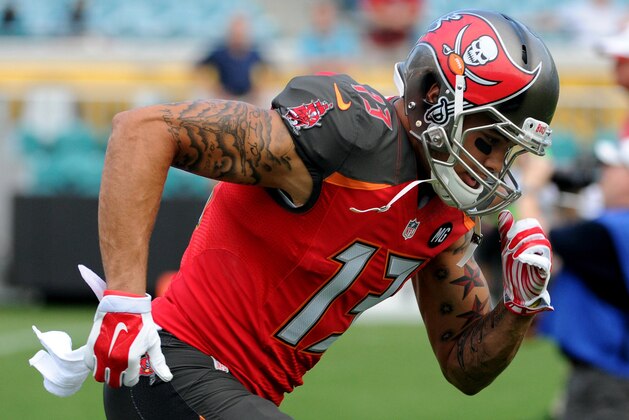 Aug 8, 2014; Jacksonville, FL, USA; Tampa Bay Buccaneers wide receiver Mike Evans (13) warms up prior to the preseason game against the Jacksonville Jaguars at EverBank Field. Mandatory Credit: Melina Vastola-USA TODAY Sports