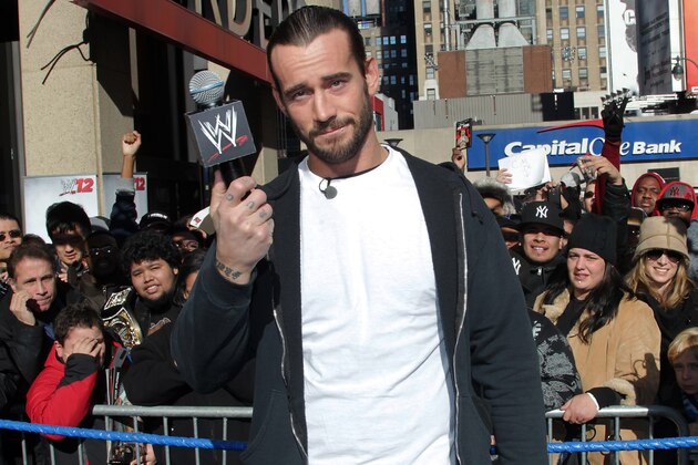 WWE Superstar CM Punk poses at Madison Square Garden, Friday, Nov. 18, 2011, in New York, during a rally leading up to the 25th Anniversary of Survivor Series, taking place Sunday at Madison Square Garden.  The event will feature actor and wrestling favorite Dwayne