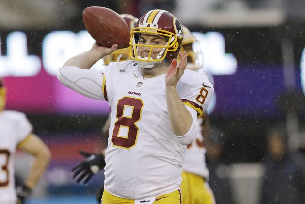 Washington Redskins quarterback Rex Grossman (8) warms up before an NFL football game against the New York Giants Sunday, Dec. 29, 2013, in East Rutherford, N.J.  (AP Photo/Julio Cortez)