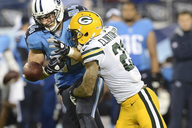 Green Bay Packers free safety Ha Ha Clinton-Dix (21) breaks up a pass intended for Tennessee Titans tight end Taylor Thompson (84) in the third  quarter of a preseason NFL football game Saturday, Aug. 9, 2014, in Nashville, Tenn. (AP Photo/Mark Zaleski)