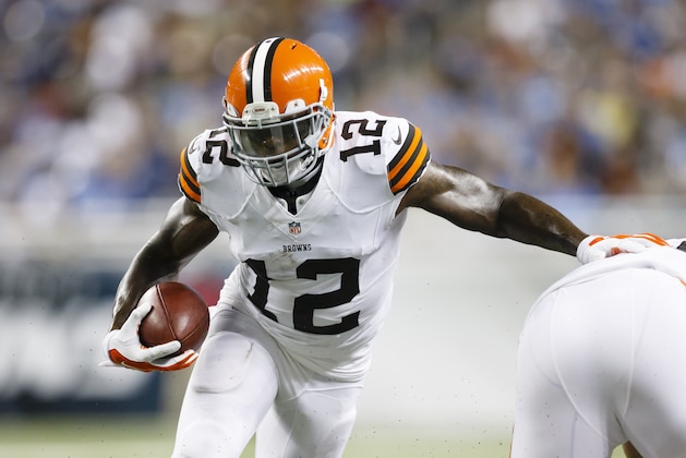 Cleveland Browns wide receiver Josh Gordon (12) runs the ball against the Detroit Lions during a preseason NFL football game at Ford Field in Detroit, Saturday, Aug. 9, 2014. (AP Photo/Rick Osentoski)