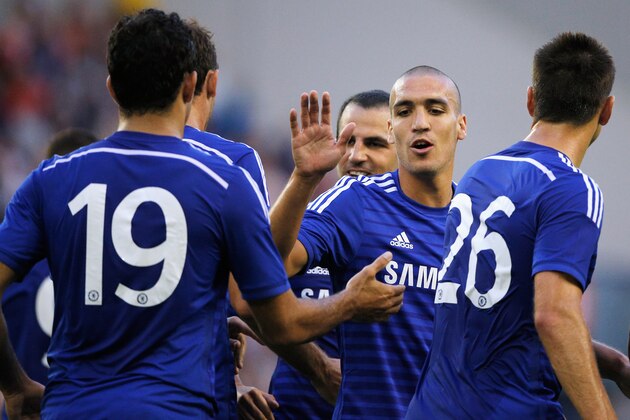 ARNHEM, NETHERLANDS - JULY 30:  Oriol Romeu (C) of Chelsea congratulates goal scorer, Nemanja Matic during the pre season friendly match between Vitesse Arnhem and Chelsea at the Gelredome Stadium on July 30, 2014 in Arnhem, Netherlands.  (Photo by Dean Mouhtaropoulos/Getty Images)