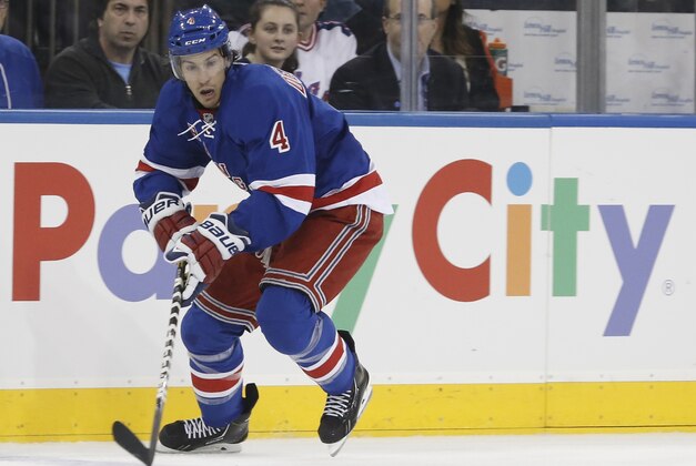 New York Rangers defenseman Michael Del Zotto (4) skates with the puck in the second period of their NHL hockey game at Madison Square Garden in New York, Monday, Oct. 28, 2013. (AP Photo/Kathy Willens) New York Rangers defenseman Michael Del Zotto (4) skates with the puck in the second period of their NHL hockey game at Madison Square Garden in New York, Monday, Oct. 28, 2013. (AP Photo/Kathy Willens)