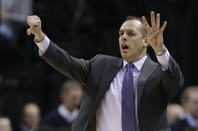 Indiana Pacers head coach Frank Vogel calls a play to his team in the second half of an NBA basketball game against the Denver Nuggets in Indianapolis, Monday, Feb. 10, 2014. The Pacers won 119-80. (AP Photo/Michael Conroy)