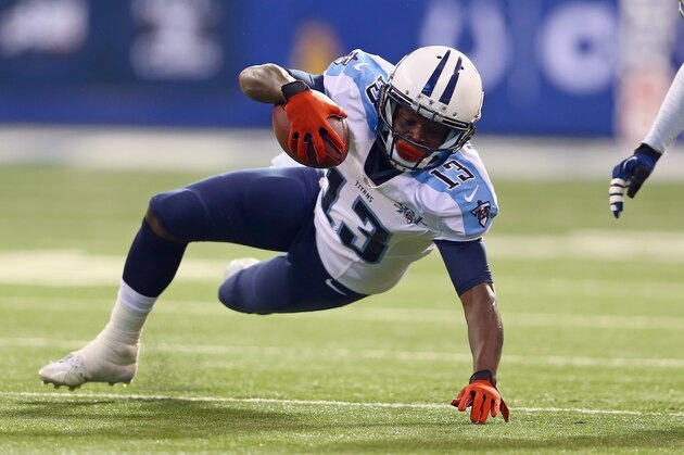INDIANAPOLIS, IN - DECEMBER 01:  Kendall Wright #13 of the Tennessee Titans runs with the ball during the NFL game against the Indianapolis Colts at Lucas Oil Stadium on December 1, 2013 in Indianapolis, Indiana.  (Photo by Andy Lyons/Getty Images)