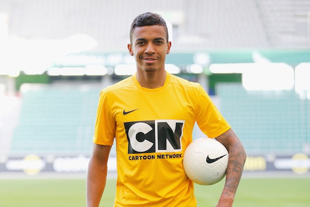 WOLFSBURG, GERMANY - MARCH 20:  Luiz Gustavo attends a shoot for Cartoon Network's competition 'Cartoon Network Academy 2014' at the VfL Wolfsburg Volkswagen Arena on March 20, 2014 in Wolfsburg, Germany.  (Photo by Boris Streubel/Getty Images For Turner Broadcasting System)