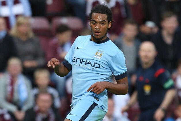 EDINBURGH, SCOTLAND - JULY 18: Jason Denayer of Manchester City in action during the Pre Season Friendly match between Hearts and Manchester City at Tyncastle Stadium on July 18, 2014 in Edinburgh, Scotland.  (Photo by Pete Norton/Getty Images)