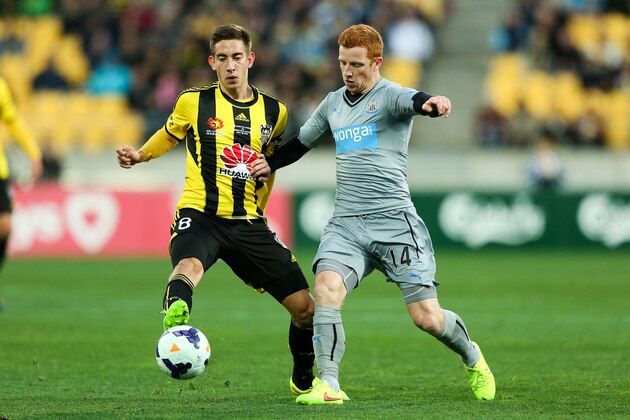 WELLINGTON, NEW ZEALAND - JULY 26:  Alejandro Gorrin of the Phoenix holds off Jack Colback of Newcastle United during the Football United New Zealand Tour 2014 match between the Wellington Phoenix and Newcastle United at Westpac Stadium on July 26, 2014 in Wellington, New Zealand.  (Photo by Hagen Hopkins/Getty Images)