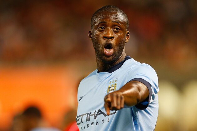 NEW YORK, NY - JULY 30:  Yaya Toure #42 of Manchester City looks on during the game against Liverpool during the International Champions Cup 2014 at Yankee Stadium on July 30, 2014 in the Bronx borough of New York City.  (Photo by Mike Stobe/Getty Images)