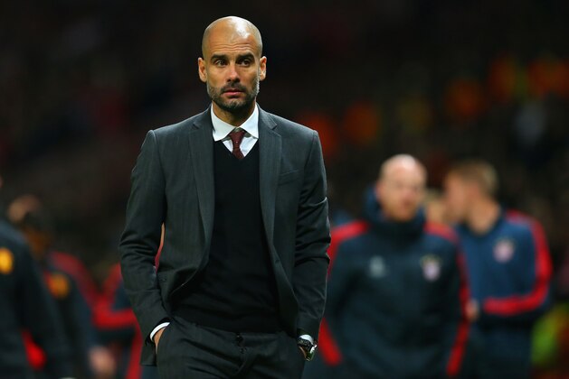 MANCHESTER, ENGLAND - APRIL 01:  Pep Guardiola head coach of Bayern Muenchen at the end of match during the UEFA Champions League Quarter Final first leg match between Manchester United and FC Bayern Muenchen at Old Trafford on April 1, 2014 in Manchester, England.  (Photo by Alex Livesey/Getty Images)