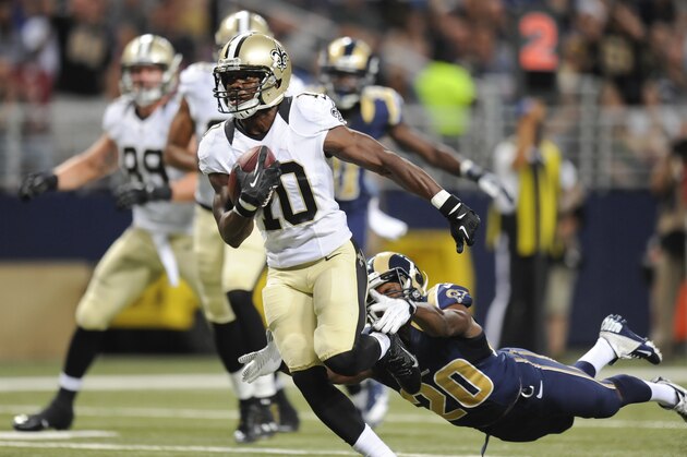 New Orleans Saints wide receiver Brandin Cooks (10) gets past St. Louis Rams cornerback Lamarcus Joyner (20) on a touchdown reception in the third quarter of a preseason NFL football game Friday, Aug. 8, 2014, in St. Louis. (AP Photo/L.G. Patterson)