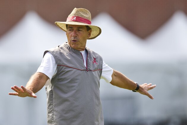 Alabama head coach, Nick Saban is directs his team during an NCAA college football practice, at the Thomas-Drew practice fields on Friday, Aug. 1, 2014, in Tuscaloosa, Ala. (AP Photo/Brynn Anderson)