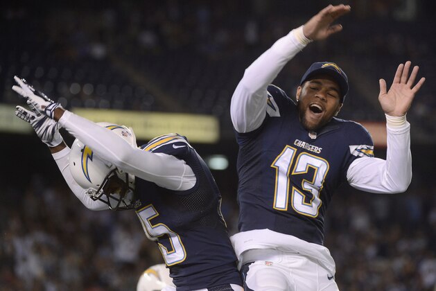 SAN DIEGO, CA - AUGUST 07:  Dontrelle Inman #15 of the San Diego Chargers is congratulated by teammate Keenan Allen #13 after scoring a touchdown against the Dallas Cowboys during a preseason game at Qualcomm Stadium on August 7, 2014 in San Diego, California.  (Photo by Donald Miralle/Getty Images)