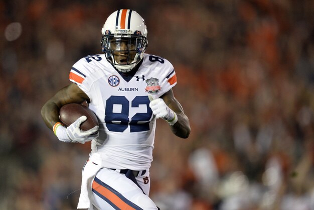 Jan 6, 2014; Pasadena, CA, USA; Auburn Tigers wide receiver Melvin Ray (82) makes a catch and runs for a touchdown against the Florida State Seminoles during the first half of the 2014 BCS National Championship game at the Rose Bowl.  Mandatory Credit: Robert Hanashiro-USA TODAY Sports