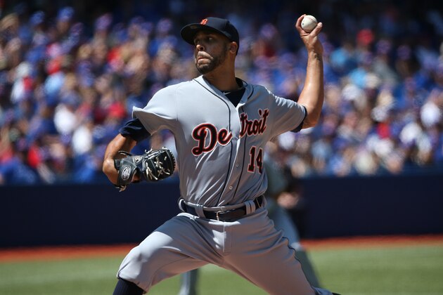 TORONTO, CANADA - AUGUST 10: David Price #14 of the Detroit Tigers delivers a pitch in the first inning during MLB game action against the Toronto Blue Jays on August 10, 2014 at Rogers Centre in Toronto, Ontario, Canada. (Photo by Tom Szczerbowski/Getty Images)