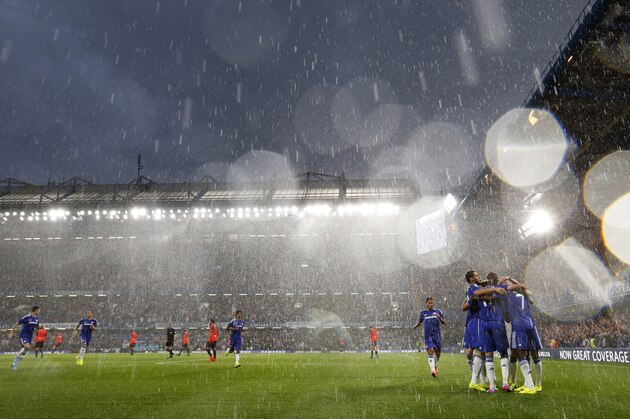 LONDON, ENGLAND - AUGUST 12: Diego Costa of Chelsea celebrates scoring his1st goal with his team mates during the pre-season friendly match between Chelsea and Real Sociedad at Stamford Bridge on August 12, 2014 in London, England.  (Photo by Steve Bardens/Getty Images)