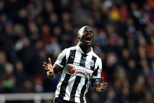 Newcastle United's captain Cheick Tiote, celebrates after their victory over Anzhi Makhachkala at the end of their Europa League round of 16 second leg soccer match at St James' Park, Newcastle, England, Thursday, March 14, 2013. (AP Photo/Scott Heppell)
