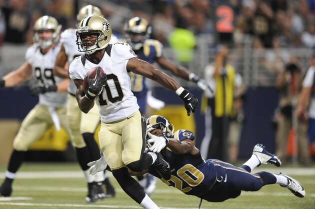 New Orleans Saints wide receiver Brandin Cooks (10) gets past St. Louis Rams cornerback Lamarcus Joyner (20) on a touchdown reception in the third quarter of a preseason NFL football game Friday, Aug. 8, 2014, in St. Louis. (AP Photo/L.G. Patterson)