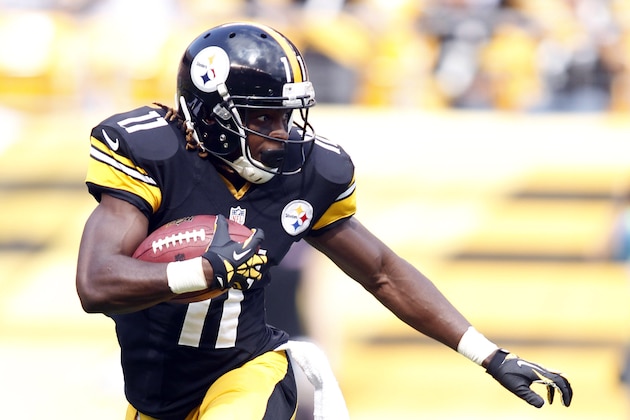Sep 8, 2013; Pittsburgh, PA, USA; Pittsburgh Steelers wide receiver Markus Wheaton (11) returns a kick-off against the Tennessee Titans during the fourth quarter at Heinz Field. The Tennessee Titans won 16-9. Mandatory Credit: Charles LeClaire-USA TODAY Sports