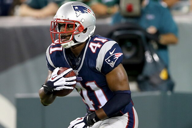 PHILADELPHIA, PA - AUGUST 09:  Justin Green #41 of the New England Patriots carries the ball against the Philadelphia Eagles on August 9, 2013 at Lincoln Financial Field in Philadelphia, Pennslyvania.  (Photo by Elsa/Getty Images)