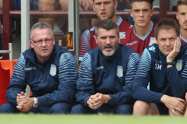 BIRMINGHAM, ENGLAND - AUGUST 09:  Paul Lambert (L) the Aston Villa manager looks on with his assistant Roy Keane during the pre season friendly match between Aston Villa and Parma at Villa Park on August 9, 2014 in Birmingham, England.  (Photo by David Rogers/Getty Images)