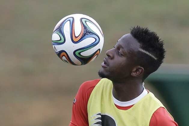 Belgium's Divock Origi controls the ball during a training session of Belgium in Mogi Das Cruzes, Brazil, Thursday, June 19, 2014. Belgium play in group H of the 2014 soccer World Cup. (AP Photo/Andrew Medichini)