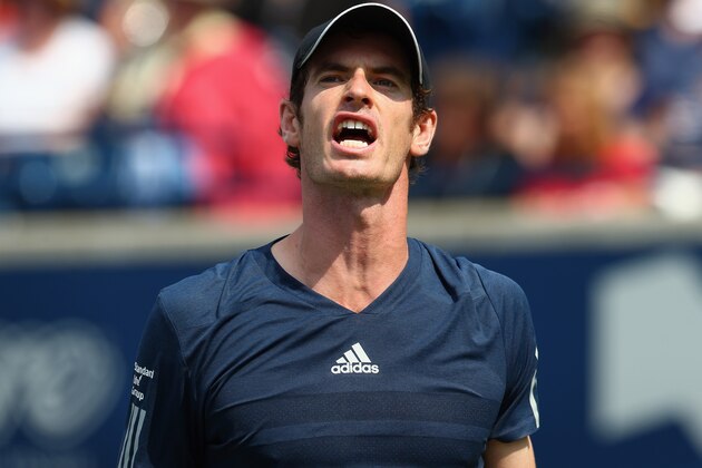 TORONTO, ON - AUGUST 08:  Andy Murray of Great Britain reacts after a point against Jo-Wilfried Tsonga of France in the quarterfinals during Rogers Cup at Rexall Centre at York University on August 8, 2014 in Toronto, Canada.  (Photo by Ronald Martinez/Getty Images)