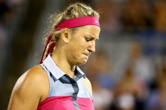 MONTREAL, QC - AUGUST 08:  Victoria Azarenka of Belarus reacts after a shot to Agnieszka Radwanska of Poland in their quarterfinal match during the Rogers Cup at Uniprix Stadium on August 8, 2014 in Montreal, Canada.  (Photo by Streeter Lecka/Getty Images)