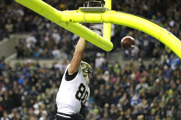 New Orleans Saints' Jimmy Graham spikes the ball through the goal posts after he scored a touchdown in the first half of an NFL football game against the Seattle Seahawks, Monday, Dec. 2, 2013, in Seattle. (AP Photo/Elaine Thompson) New Orleans Saints' Jimmy Graham spikes the ball through the goal posts after he scored a touchdown in the first half of an NFL football game against the Seattle Seahawks, Monday, Dec. 2, 2013, in Seattle. (AP Photo/Elaine Thompson)