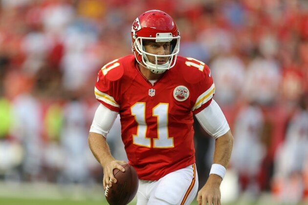 Kansas City Chiefs quarterback Alex Smith (11) scrambles in the first half of an NFL preseason football game against the Cincinnati Bengals Thursday, Aug. 7, 2014, in Kansas City, Mo. (AP Photo/Ed Zurga) Kansas City Chiefs quarterback Alex Smith (11) scrambles in the first half of an NFL preseason football game against the Cincinnati Bengals Thursday, Aug. 7, 2014, in Kansas City, Mo. (AP Photo/Ed Zurga)