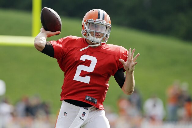 Cleveland Browns quarterback Johnny Manziel passes during practice at NFL football training camp in Berea, Ohio Tuesday, Aug. 12, 2014. (AP Photo/Mark Duncan)