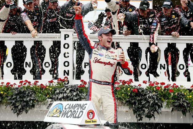 LONG POND, PA - AUGUST 02:  Austin Dillon, driver of the #3 Yuengling Light Lager Chevrolet, celebrates in Victory Lane after winning the NASCAR Camping World Truck Series Pocono Mountains 150 at Pocono Raceway on August 2, 2014 in Long Pond, Pennsylvania.  (Photo by Sarah Glenn/Getty Images)