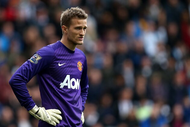 Manchester United's goalkeeper Anders Lindegaard during their English Premier League soccer match against Newcastle United at St James' Park, Newcastle, England, Saturday, April 5, 2014. (AP Photo/Scott Heppell)