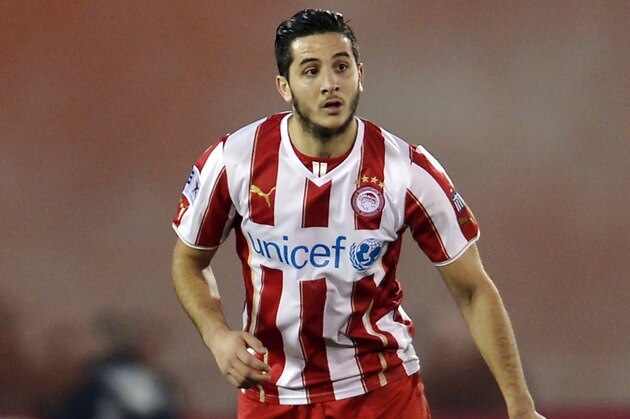 ATHENS,GREECE - JANUARY 12:  Kostas Manolas of Olympiacos during the Greek Superleague match between Atromitos Athinon and Olympiacos at the Peristeri Stadium on January 12, 2014 in Athens,Greece.  (Photo by Aris Messins/EuroFootball/Getty Images)