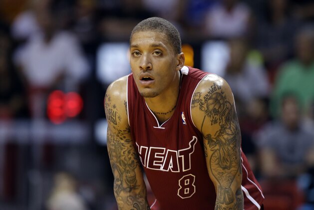Miami Heat's Michael Beasley (8) stands on the court during the second half of an NBA basketball game against the Detroit Pistons, Tuesday, Dec. 3, 2013, in Miami. The Pistons defeated the Heat 107-97. (AP Photo/Lynne Sladky)