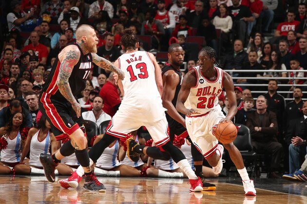 CHICAGO, IL - MARCH 9: Tony Snell #20 of the Chicago Bulls handles the ball against the Miami Heat at the United Center in Chicago. NOTE TO USER: User expressly acknowledges and agrees that, by downloading and or using this photograph, User is consenting to the terms and conditions of the Getty Images License Agreement. Mandatory Copyright Notice: Copyright 2014 NBAE (Photo by Nathaniel S. Butler/NBAE via Getty Images)