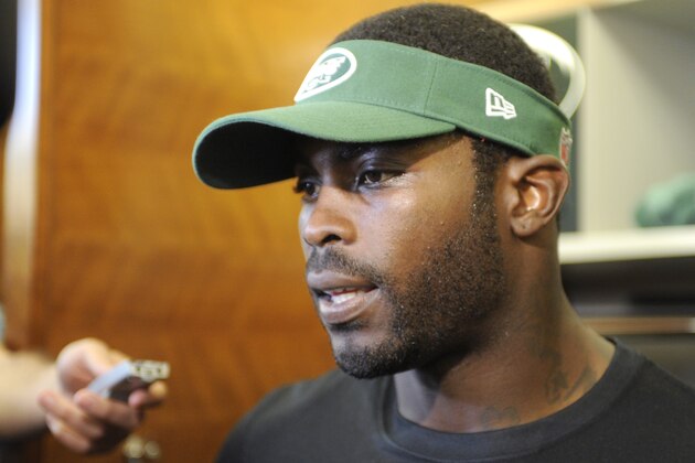 New York Jets NFL football quarterback Michael Vick speaks to the media Thursday, May 22, 2014, in Florham Park, N.J. (AP Photo/Bill Kostroun) New York Jets NFL football quarterback Michael Vick speaks to the media Thursday, May 22, 2014, in Florham Park, N.J. (AP Photo/Bill Kostroun)