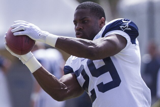 Dallas Cowboys running back DeMarco Murray (29) catches a pass at NFL football training camp, Wednesday, July 30, 2014, in Oxnard, Calif. (AP Photo/Ringo H.W. Chiu)