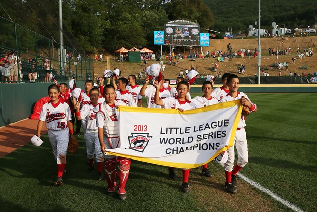 WILLIAMSPORT, PA - AUGUST 25:  Members of the Tokyo, Japan team celebrate after defeating the West team from Chula Vista, Ca 6-4  during the Little League World Series Championship game on August 25, 2013 in Williamsport, Pennsylvania.  (Photo by Rob Carr/Getty Images)