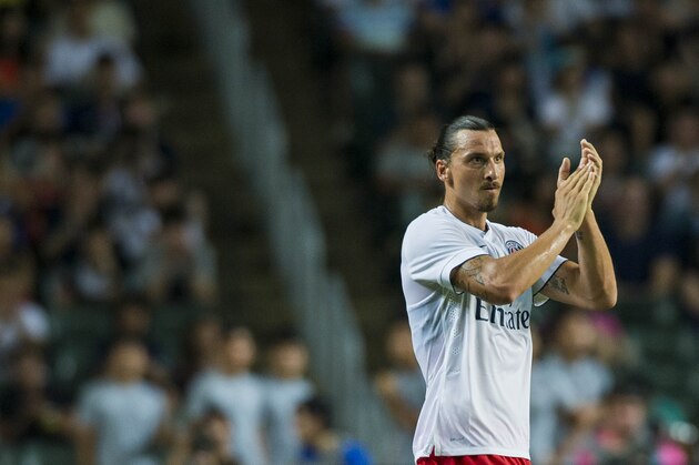 HONG KONG - JULY 29:  Zlatan Ibrahimovic of Paris Saint-Germain acknowledges to the crowd during the friendly match between Kitchee and Paris Saint-Germain at Hong Kong Stadium on July 29, 2014 in Hong Kong, Hong Kong.  (Photo by Victor Fraile/Getty Images)