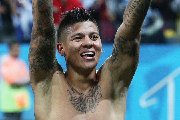 SAO PAULO, BRAZIL - JULY 09: Marcos Rojo of Argentina celebrates after defeating the Netherlands in a penalty shootout during the 2014 FIFA World Cup Brazil Semi Final match between the Netherlands and Argentina at Arena de Sao Paulo on July 9, 2014 in Sao Paulo, Brazil.  (Photo by Dean Mouhtaropoulos/Getty Images)