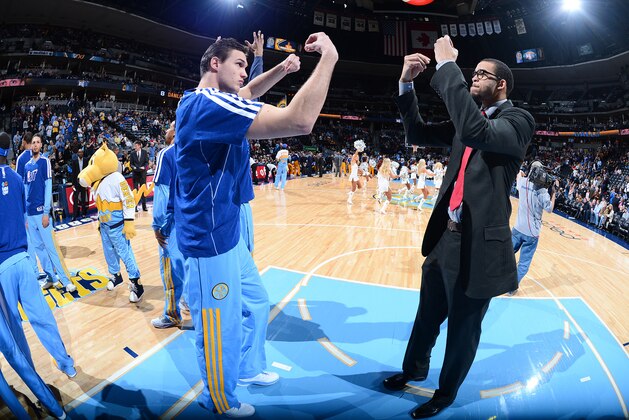 DENVER, CO - JANUARY 28: Danilo Gallinari #8 and JaVale McGee #34 of the Denver Nuggets greet each other in pre-game announcements before the game against the Indiana Pacers on January 28, 2013 at the Pepsi Center in Denver, Colorado. NOTE TO USER: User expressly acknowledges and agrees that, by downloading and/or using this Photograph, user is consenting to the terms and conditions of the Getty Images License Agreement. Mandatory Copyright Notice: Copyright 2013 NBAE (Photo by Garrett W. Ellwood/NBAE via Getty Images)